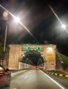 view of a car entering a Menora tunnel
