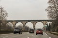 Arched overpass over the highway.
