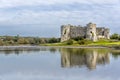 A view of the Carew River, Pembrokeshire and the ruins of the Norman castle Royalty Free Stock Photo