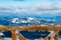 View of Carpathian mountains through a fence