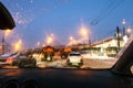 View of cars and street cleaning machine in winter Royalty Free Stock Photo