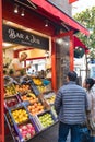 People being served at a juice bar in the old town of Saint-Malo