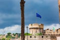 View of Castel Sant` Angelo, Saint Giovanni bastion, EU flag . Cloudy summer day