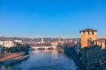 View from Castelvecchio castle of the Adige River and the bridge Ponte della Vittoria. Winter time, the beginning of the evening. Royalty Free Stock Photo