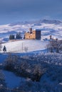 View of the Castle of Grinzane Cavour Unesco symbol surrounded by hills and snowy vineyards Royalty Free Stock Photo