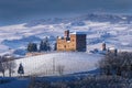 View of the Castle of Grinzane Cavour Unesco symbol surrounded by hills and snowy vineyards Royalty Free Stock Photo