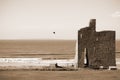 View of castle and rippled sandy beach Royalty Free Stock Photo