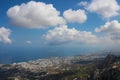 View from the castle of Saint Hilarion on the city of Kyrenia, mountains, fluffy clouds and the Mediterranean sea. Cyprus Royalty Free Stock Photo