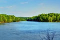 A view looking down the Catawba river with forest on each side.