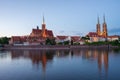 The view of Cathedral island Tumski from the opposite side of the Oder river. The Cathedral of St. John the Baptist. Church of St