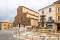 View at the Cathedral of Saint Peter the Apostle and fountain at the Liberty place in Faenza - Italy Royalty Free Stock Photo