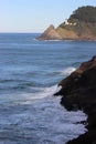 View from a cave looking out onto Lighthouse Royalty Free Stock Photo