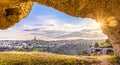 View through cave of sassi di Matera,basilicata, Italy, UNESCO under blue sky and sun flare