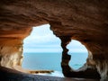 view of cave with sea waves and blue sky, Ai Generated Royalty Free Stock Photo