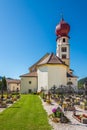View at the Cemetery with Church of Saint George in Tiers village in Italy Royalty Free Stock Photo