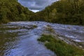 A view from Cenarth up the river Teifi, Wales after heavy rainfall Royalty Free Stock Photo