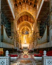 view of the central nave and altar of the Monreale Cathedral in Sicily