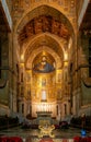 view of the central nave and altar of the Monreale Cathedral in Sicily