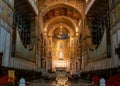 view of the central nave and altar of the Monreale Cathedral in Sicily