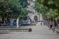 View of the central square in downtown Lamego, statue with dove on the head and people walking and visiting