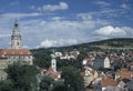 View of Cesky Krumlov with the round painted tower of its Castle and the church of St. Jost. Cesky Krumlov is one of the most Royalty Free Stock Photo