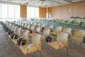 Modern conference hall with rows of chairs. rows of seats in interior of modern empty conference hall for business meetings Royalty Free Stock Photo