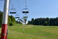 View on chairs of ski lift in abandoned ski resort , Jasenska dolina, located in the Turiec region, Slovakia. Royalty Free Stock Photo