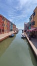 View of the channel of the island of Burano, colorful houses of the island of Burano, Italy