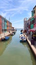 View of the channel of the island of Burano, colorful houses of the island of Burano, Italy