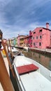 View of the channel of the island of Burano, colorful houses of the island of Burano, Italy
