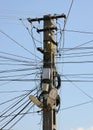 Chaos of the wires on an electric pole, Romania