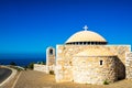 Picturesque chapel at the street to village of Limeni with clear waters, Mani, Peloponnese, Greece