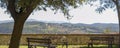 View of the characteristic Italian countryside. Rural scene in relaxation. Belvedere with benches Royalty Free Stock Photo