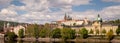 View on Charles Bridge and Prague Castle over Vltava River during early night with wonderful dusk sunset Royalty Free Stock Photo