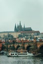 View of Charles Bridge with St. Vitus Cathedral in the background.