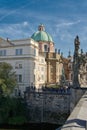 View from Charles Bridge to the Church of St Francis Seraph, Kostel sv. FrantiÅ¡ka SerafinskÃ©ho in Prague Royalty Free Stock Photo