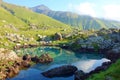 View on Chaukhi mountain pass from Abudelauri Blue Lake in Caucasus mountains, Georgia