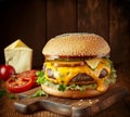 View of cheeseburger is a classic American dish that boasts a juicy beef patty cooked to perfection and topped with melted cheese