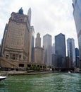 View of the Chicago River between the skyscrapers of the city of Chicago, Illinois, United States Royalty Free Stock Photo