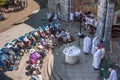 View on the Christian disabled pilgrims during the divine service in the Sanctuary of Our Lady of Lourdes