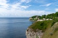 View of the church at Hojerup on top of the white chalkstone cliffs of Stevns Klint Royalty Free Stock Photo