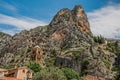 View of the church Notre-Dame de Beauvoir amid the cliffs and steeple of Moustiers-Sainte-Marie. Royalty Free Stock Photo