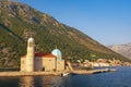 View of Church of Our Lady of the Rocks Gospa od Skrpjela on sunny summer day. Montenegro, Bay of Kotor Royalty Free Stock Photo