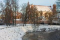 View of the Church of St. Francis and Bernard near the river Vilnia in the Old Town of Vilnius in winter. Lithuania Royalty Free Stock Photo