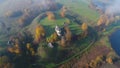 View on the Church of St. George, October morning aerial video. Trigorskoe, Pushkin Mountains
