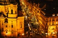 View of the Church of St. Nicholas and street. Night Christmas Decoration of Prague`s main square. Street, open area Royalty Free Stock Photo