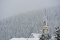 View of Church surrauded by mountains in Arabba village, Dolomites Alps, Italy Royalty Free Stock Photo