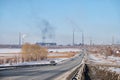 View of the Chuysky Trakt road and the town of Linyovo in the Novosibirsk region in winter