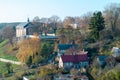 View of the city from above. Autumn landscape. Bright and colorful background. Old church in a small town. Small houses in the Royalty Free Stock Photo