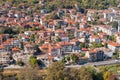 View of the city from above. The tiled roofs of the houses